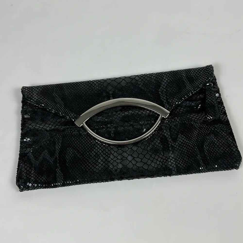 Bebe faux snake skin clutch with silver hardware